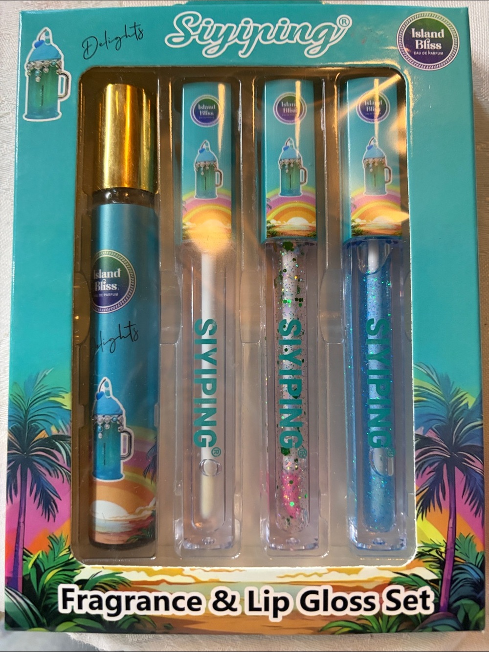 ISLAND BLISS 
Fragrance and lip sparkle gloss